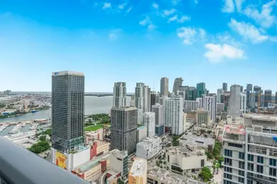 an aerial view of a city skyline with skyscrapers at Lux 2BR Natiivo Condo With Pool, Spa and Gym Access in Miami