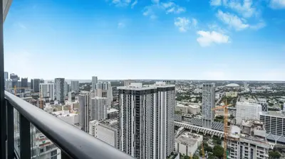 a view of a city from the top of a building at 49th Floor Sleek Condo Cozy Pool, Gym and Spa Stay in Miami