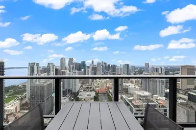 a view of the city from the balcony at PH 49 Floor Luxury Studio w Free Parking in Miami