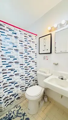 a bathroom with a toilet and a sink at Apt 202 Near Cruise Port, 5 Min to Downtown, 4 Min to Trains, 14Min to Airp in Miami