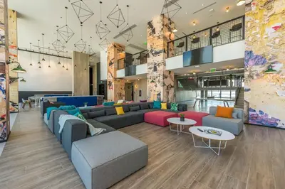 a lobby with couches and tables in a building at The Bayfront VII in Miami