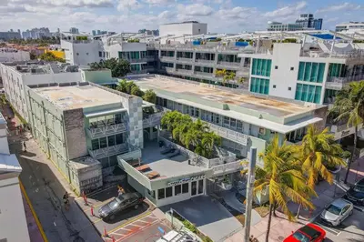 an overhead view of a city with buildings and palm trees at Escape 2 Beach, Ocean Dr Deco Apt with 2 Queen beds in Miami Beach