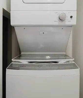 a white stove top oven in a white refrigerator at Prime 2BR Near FLL Airport, Dania Beach & Pointe in Fort Lauderdale