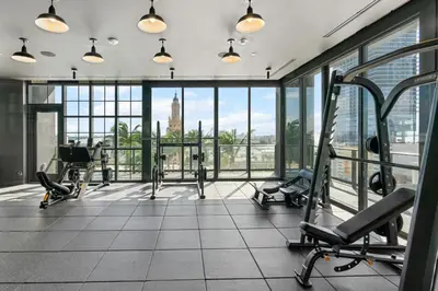 a gym with cardio equipment in a building at NEW Luxurious Apartment Floor 35th - Miami's heart in Miami