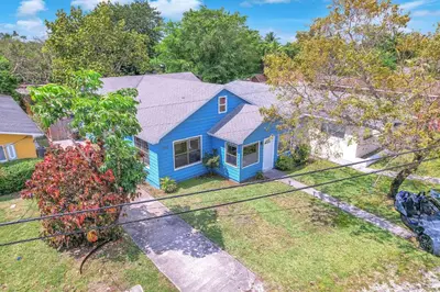 an aerial view of a blue house at Contemporary 4 Bedroom Oasis - Private Large Patio in North Miami