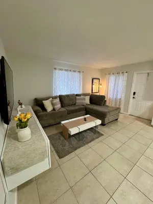 a living room with a couch and a coffee table at Apartment in Hollywood close to beach & shops 101 in Hollywood