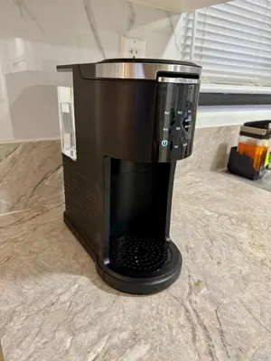 a black coffee maker sitting on a counter at Apartment in Hollywood close to beach & shops 101 in Hollywood