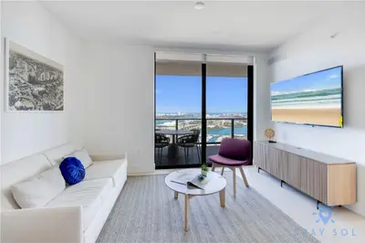 a living room with a couch and a table at Apartment 3BR-3 BTH - Gym & Pool in Miami