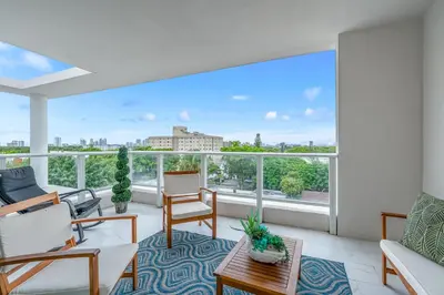 a living room with a view of a city at Stylish Apt with Pool and Gym near beach in Hollywood