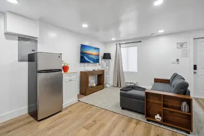 a living room with a refrigerator and a couch at Casa Roselle # 3 in Hollywood