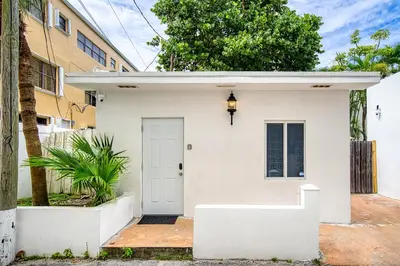 a white house with a white door at Casa Roselle # 3 in Hollywood