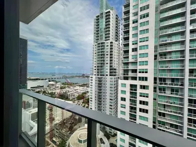 a view of a city from the balcony of a building at Stylish Downtown Miami Getaway 30th Story View in Miami