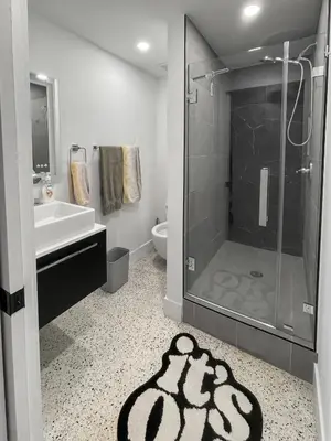 a bathroom with a shower and a sink at Newly Remodeled full Apartment in Miami