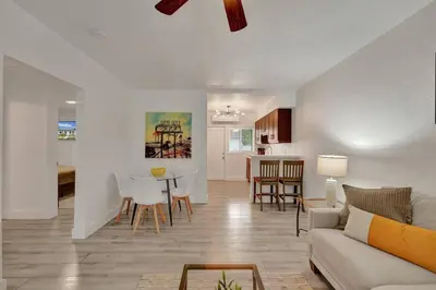 a living room with a couch and a table at Explorer's Retreat Villa in Miami