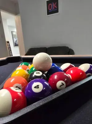 a bunch of billiard balls in a table at Sunset Retreat at Heart of Miami with pool in Miami