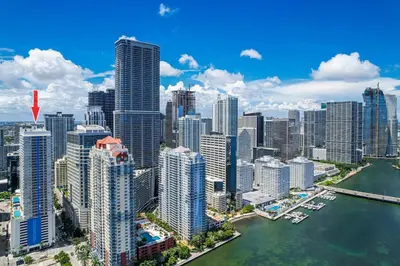 an aerial view of a city with tall buildings at Modern Studio with Balcony, Pool, Gym and Games in Miami