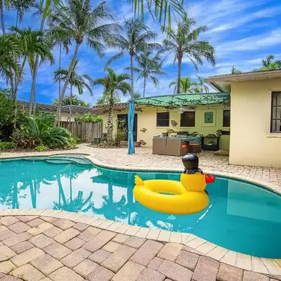 3-Bedroom Villa with Heated Pool and Tropical Yard in Hollywood Lakes