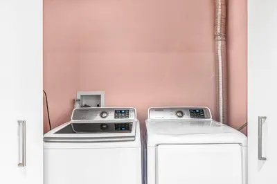 a room with two washers and a stove at Casa Praga - Big pool & BBQ - Miami Fun in Tamiami