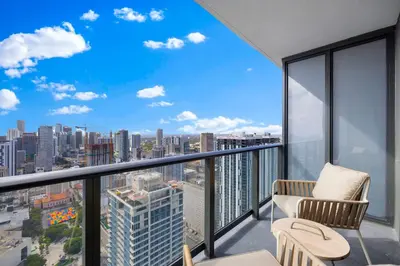 a balcony with a view of a city at Luxury Studio on 47th! Floor in Downtown Miami in Miami