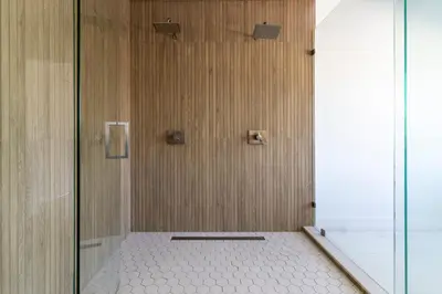 a shower with a glass door in a bathroom at April Sale! 4BR - Private Yard, Grill, Soaking Tub, Near Coral Gables & MIA Airport in Tamiami