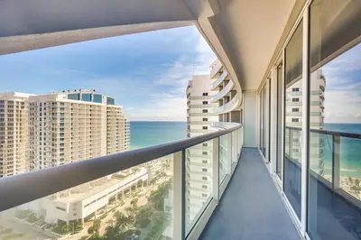 a balcony with views of the ocean and buildings at Balcony with Ocean View Fort Lauderdale Oasis! in Fort Lauderdale