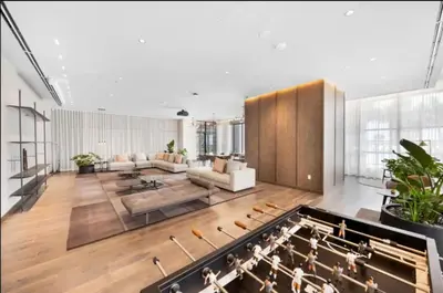 a large living room with a couch and a organ at Lux 48th Floor Condo, Water views, Pool, Gym and Spa in Miami