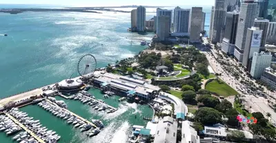 an aerial view of a city with a marina at Lux 48th Floor Condo, Water views, Pool, Gym and Spa in Miami