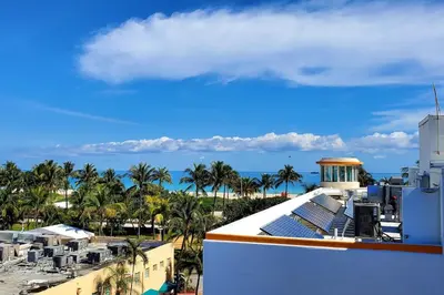 a view of the beach from the roof of a building at Cozy Apartment on South Beach in Miami Beach