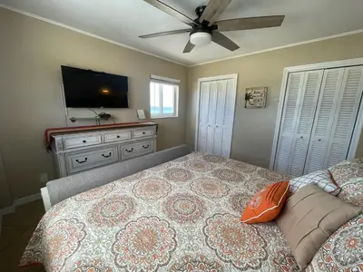 a bedroom with a bed and a flat screen tv at Penthouse 2BED2BATH with ocean view & Parking - LaPlaya in Hollywood
