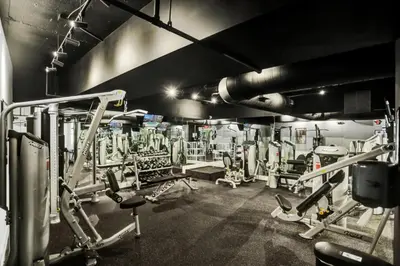 a gym with lots of equipment in a room at Charming Ocean View Condo with Beach Service 1516 in Miami Beach