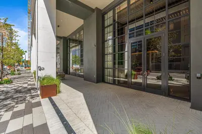 an empty sidewalk in front of a building at On 46th Floor! Amazing Views and Free Parking in Miami