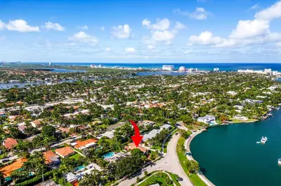 an aerial view of a city next to the water at Luxurious 5BR and 3BA Lakefront Villa near Beach in Hollywood