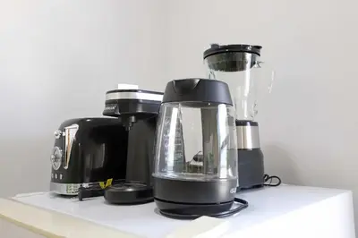 a blender sitting on top of a shelf at Rooftop Retreat on Ocean Drive with Beach View in Miami Beach