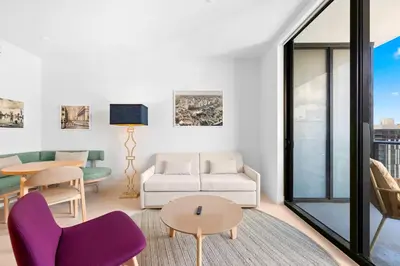 a living room with a couch and a table at Luxury Condo on 44th Floor - Downtown Plus Parking in Miami