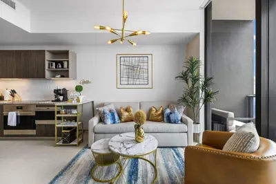 a living room with a couch and a table at PH 5107 Gale Luxury 1BR with Sea - Downtown Views in Miami