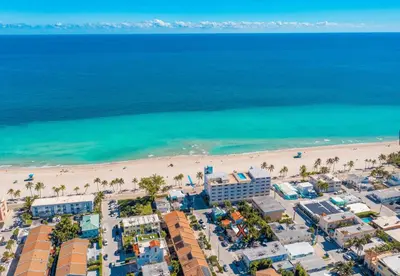 an aerial view of a beach and buildings at Villa Treasure on the beach by The Gold Nests in Hollywood