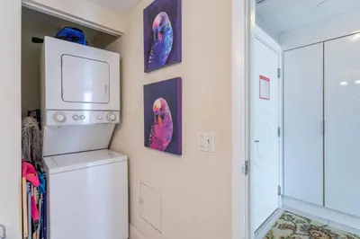 a kitchen with a refrigerator and a microwave at Luxury Large 1BR at The Carlyle SoBe Sleeps 4 in Miami Beach