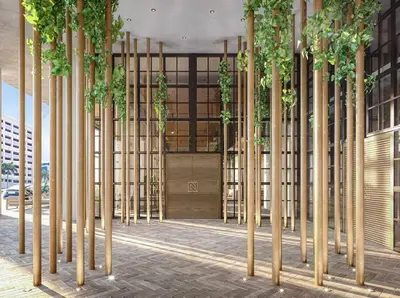 a group of bamboo poles with plants in a building at NEW Luxury Bay View Downtown 1 Bedroom in Miami