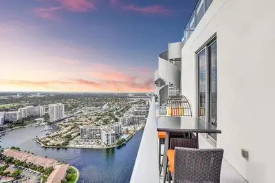 an apartment balcony with a view of a river at Hollywood SkyView Penthouse in Hollywood