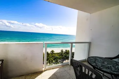 a balcony with a view of the ocean at Castle 830 OceanView Balcony Studio, Pool, Tennis, Free Parking in Miami Beach