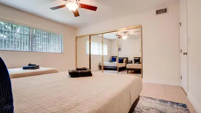 a bedroom with a bed and a ceiling fan at Serene 1BR Haven Fort Lauderdale in Fort Lauderdale