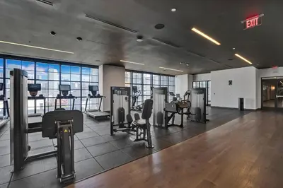 a gym with treadmills and exercise equipment in a building at New 2-Bdrm Downtown Miami Apartment with Bay Vista in Miami