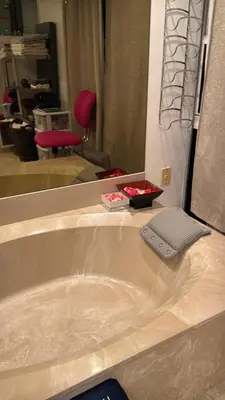 a bath tub in a bathroom with a mirror at Penthouse 2 stroy 2 bedroom water views to share in Miami