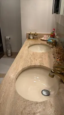 a sink in a bathroom with a marble counter top at Penthouse 2 stroy 2 bedroom water views to share in Miami