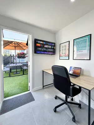 a office with a desk and a laptop on a table at Quiet Shenandoah Retreat, Central Miami in Miami
