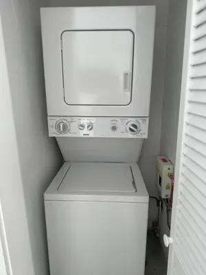 a white washer and dryer in a bathroom at Villa Clara VIP-Little Havana in Miami