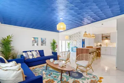 a living room with a blue ceiling at Casa Santorini - Big Pool - Barbacoa - Fun and Relax in Miami