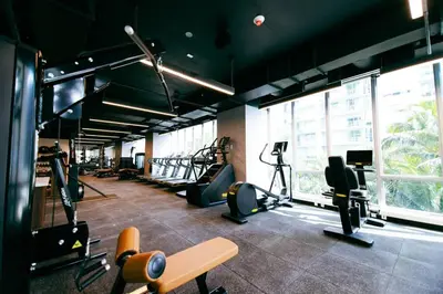a gym with treadmills and machines in a building at Charming 2 BR Downtown Miami 2106 Free Parking in Miami