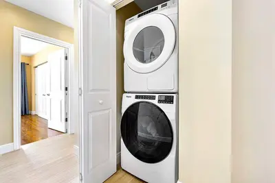 a washer and dryer stacked on top of each other in a room at Coral Shores Waterfront Heated Pool Hosts 14! in Fort Lauderdale