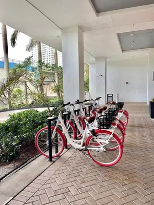 a row of bikes parked in a building at Amazing Family Studio at Beachwalk on Hallandale in Hallandale Beach